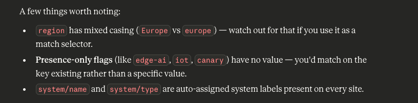 AI assistant providing tips on using site labels, highlighting mixed casing for the region label and auto-assigned system labels.